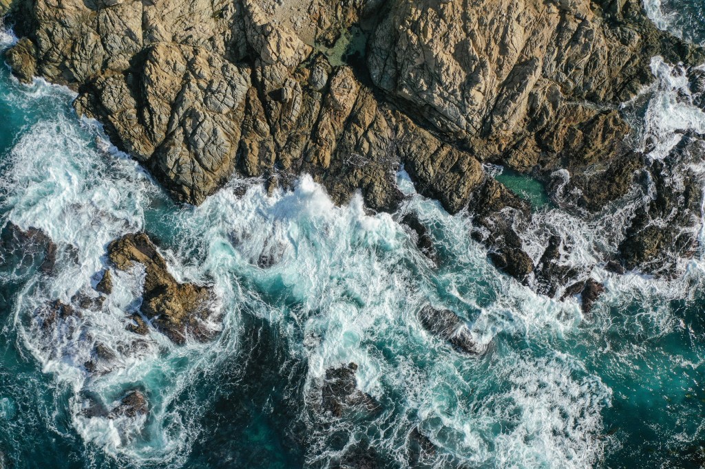 Big Sur Ocean Cliffside Aerial shot Live an Extraordinary Life, This Life. 